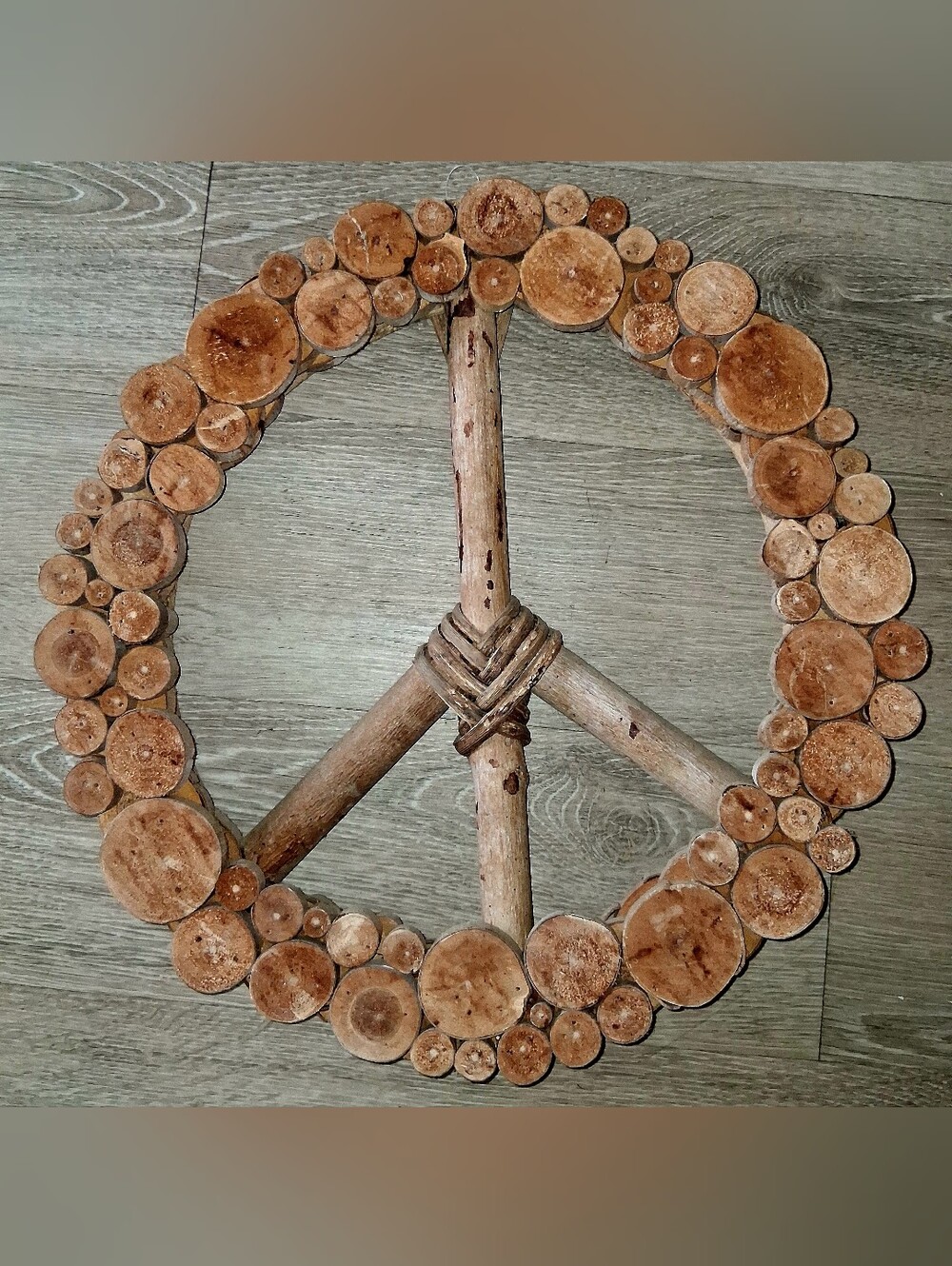 Natural Wood Peace Sign Wall Decor in Brown